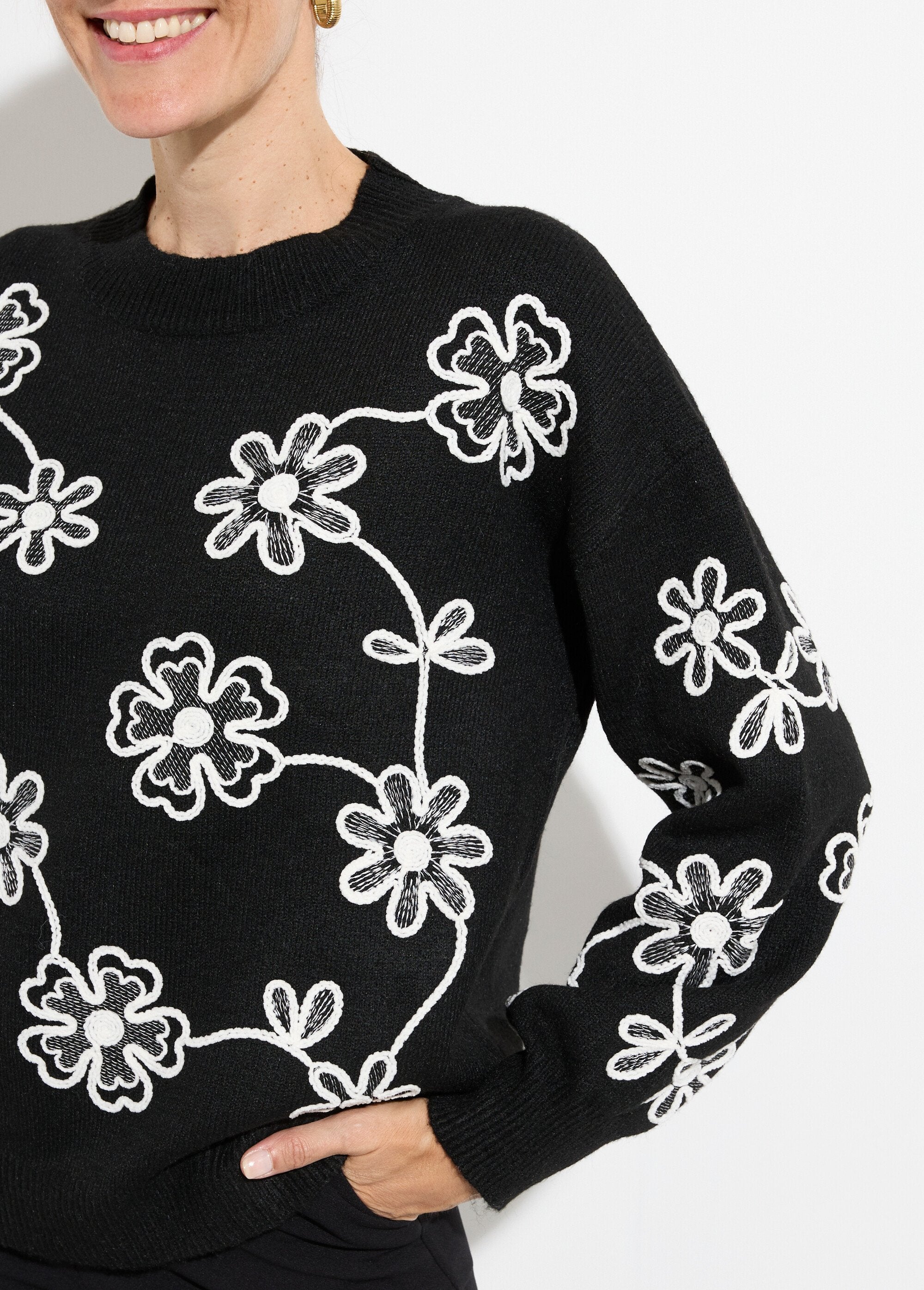 High-top_sweater_with_embroidered_flower_application_Black_DE1_slim