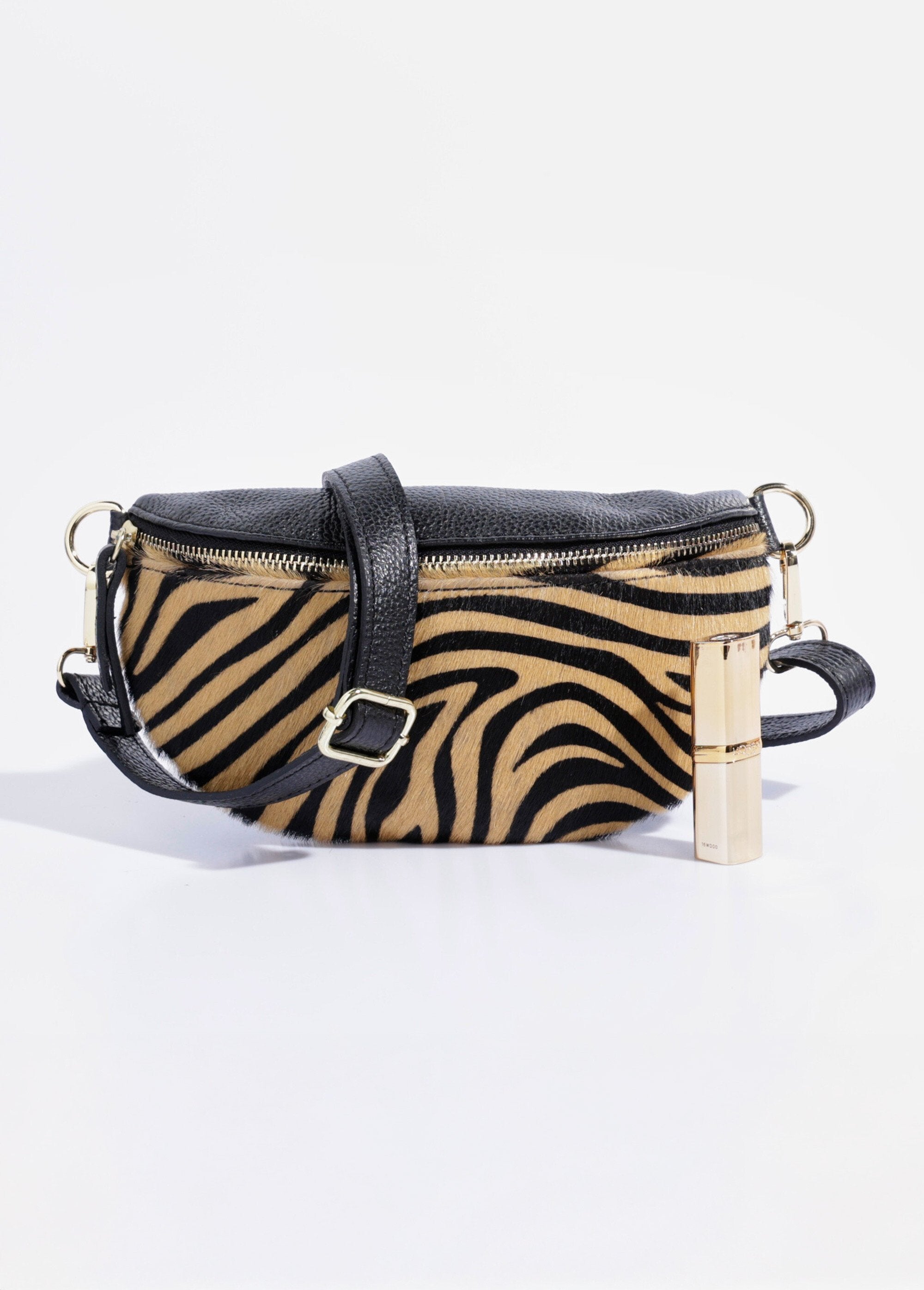 Two-material_belt_bag_in_plain_and_zebra-print_leather_camel_FA1_slim